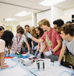 Participants work on a hands-on laboratory experiment.