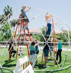 architecture students constructing geodesic dome at stanford